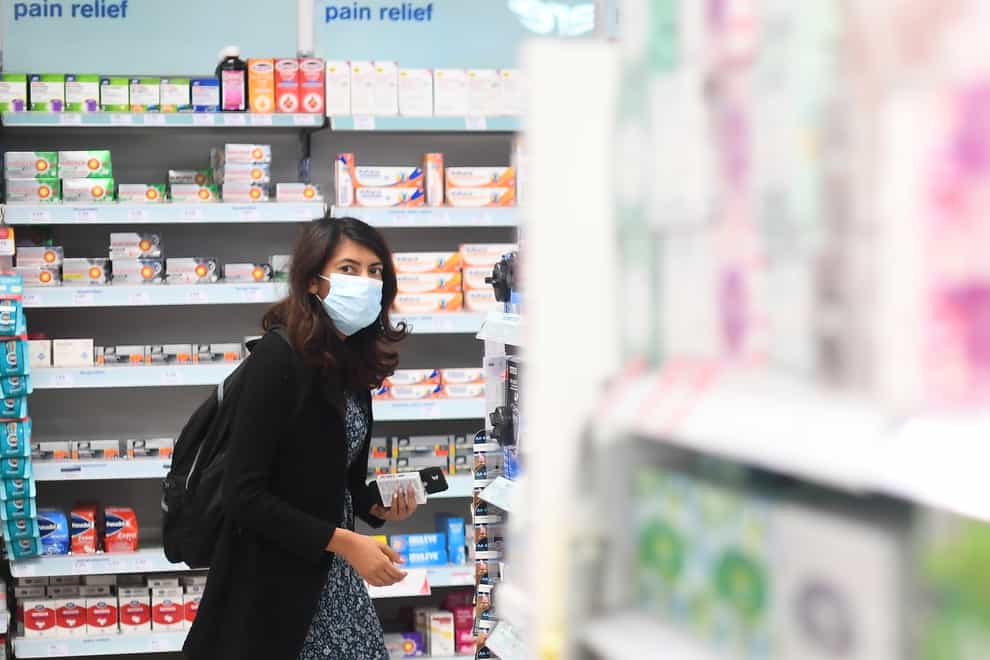 A shopper wearing a face mask
