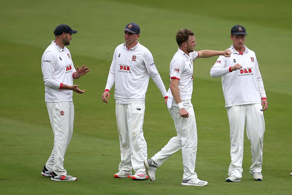 Essex’s Sam Cook (centre right) celebrates after bowling out Somerset’s Ben Green