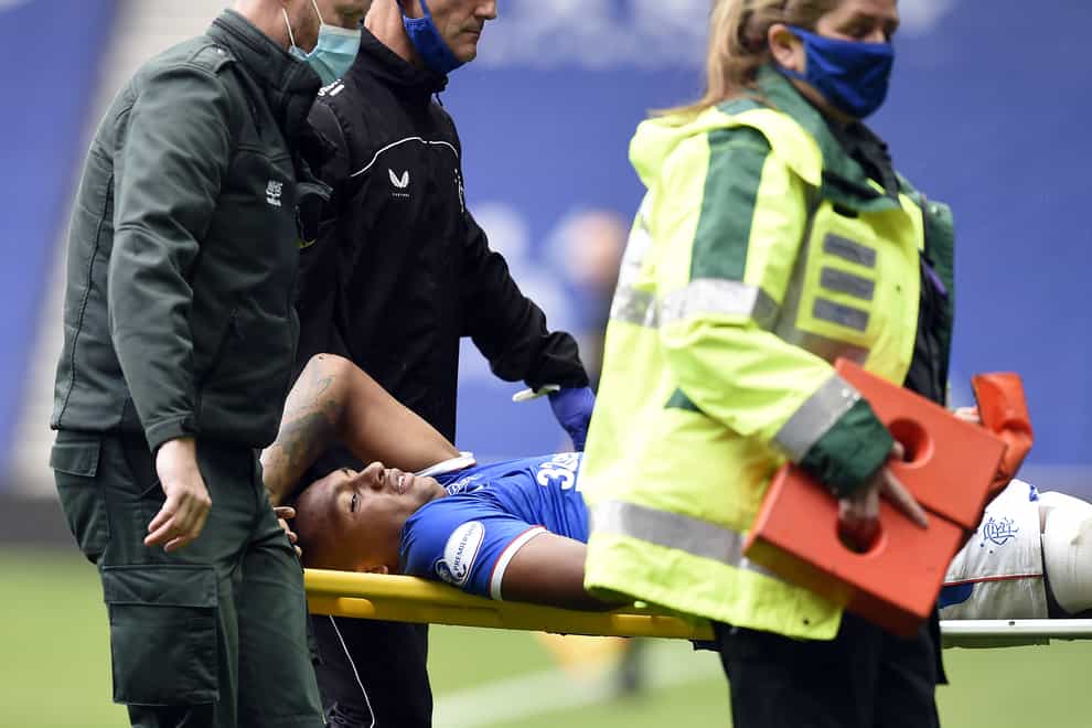 Rangers’ Alfredo Morelos is taken off the pitch on a stretcher after a tackle from Dundee United defender Ryan Edwards