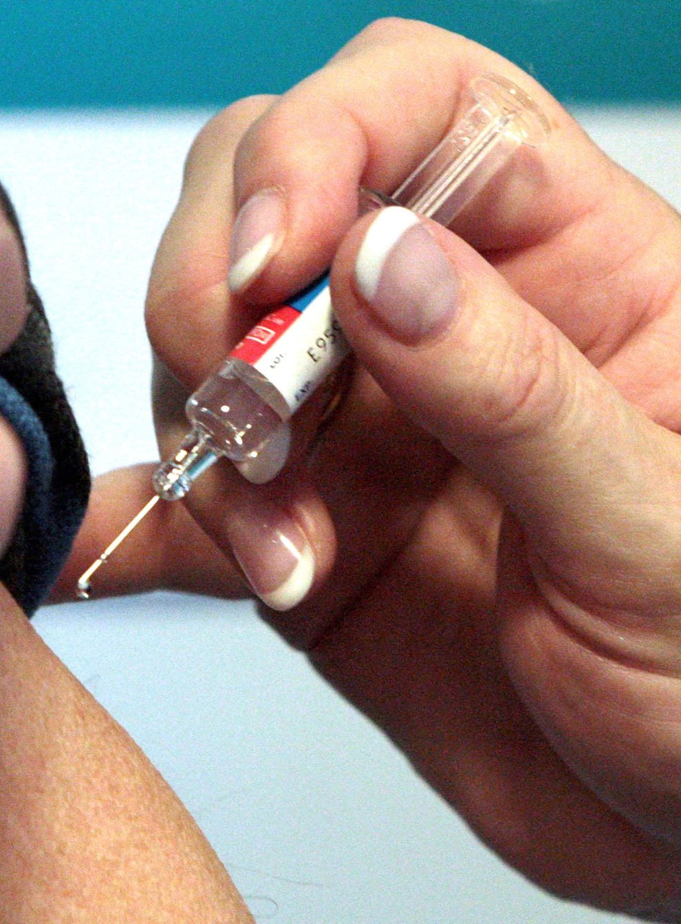 A person receiving a vaccination
