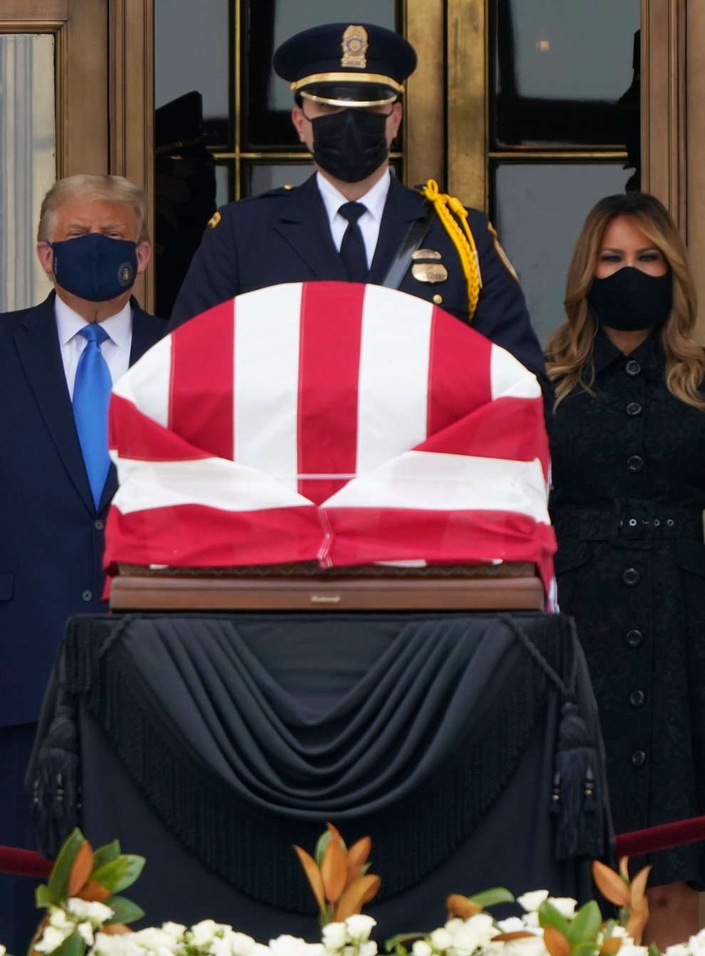 President Donald Trump and first lady Melania Trump pay respects as Justice Ruth Bader Ginsburg lies in repose at the Supreme Court