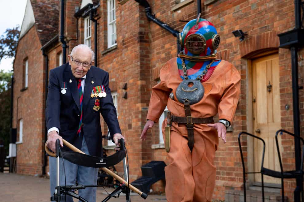 Captain Sir Tom Moore in Marston Moretaine, Bedford with veteran fundraiser Lloyd Scott, who will attempt to climb the Three Peaks whilst wearing a deep sea diving suit.