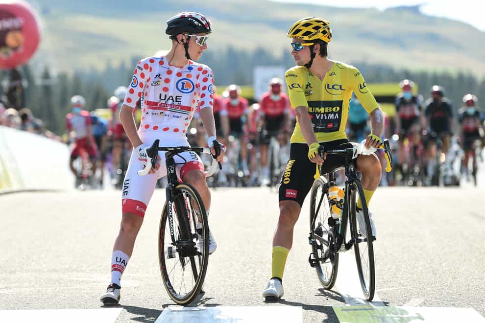 Pogacar (left) won the Tour de France from Roglic (right) after a sensational performance in the penultimate stage