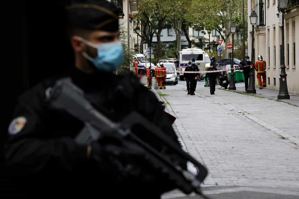 A French gendarme guards a street after a knife attack in Paris