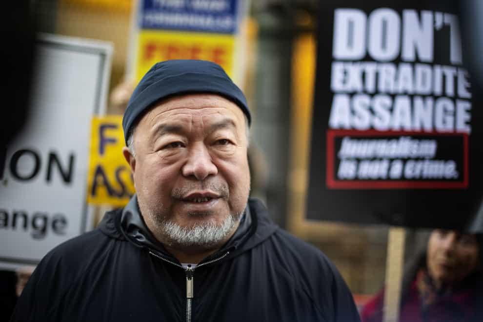 Chinese contemporary artist and activist Ai Weiwei during a silent protest outside the Old Bailey in London in support of Julian Assange