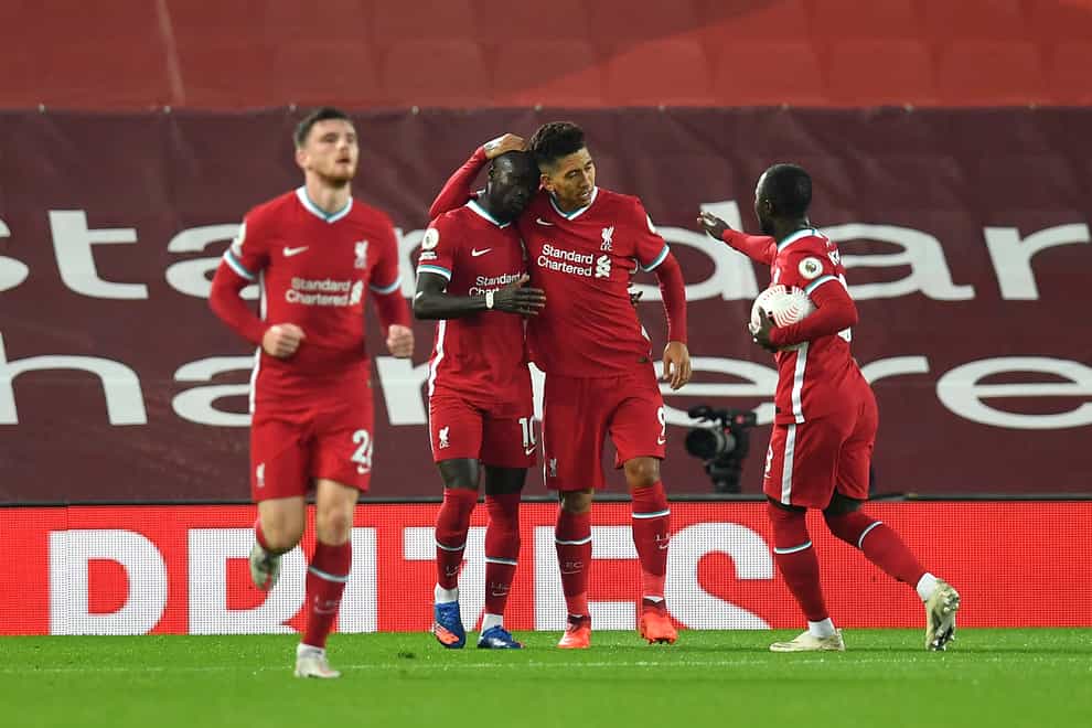 Liverpool’s Sadio Mane (second left) celebrates scoring his side’s first goal