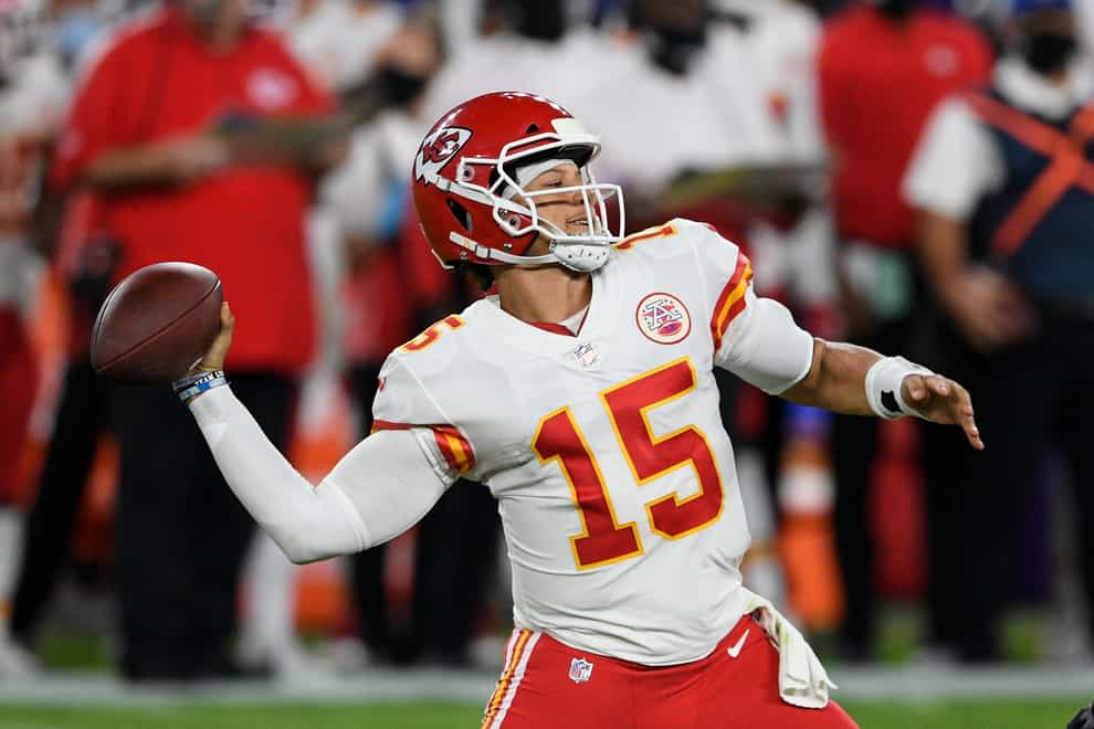 Kansas City Chiefs quarterback Patrick Mahomes throws a touchdown pass