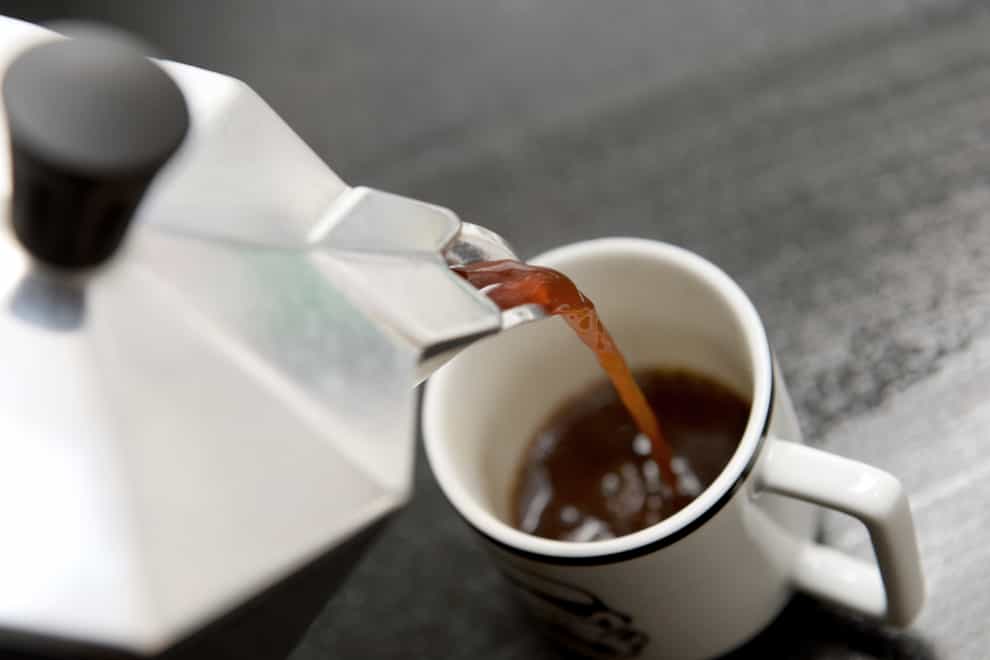 Coffee being poured from a stovetop espresso coffee maker (Anthony Devlin/PA)
