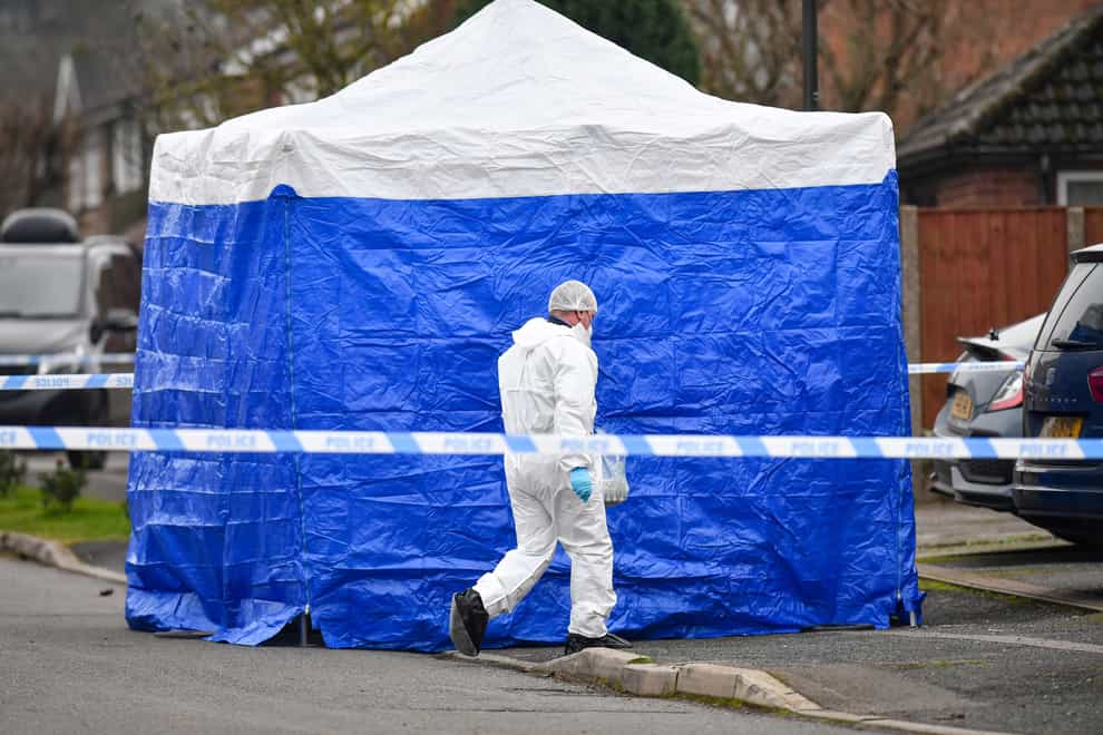 Forensic officers at the scene in Duffield, Derbyshire