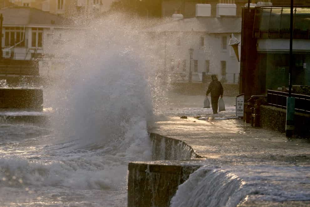 Waves crash along the coast at Swanage in Dorset