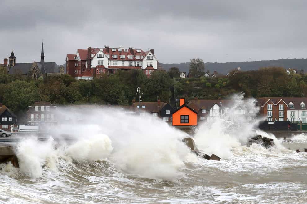 Waves hit the harbour wall in Folkestone, Kent
