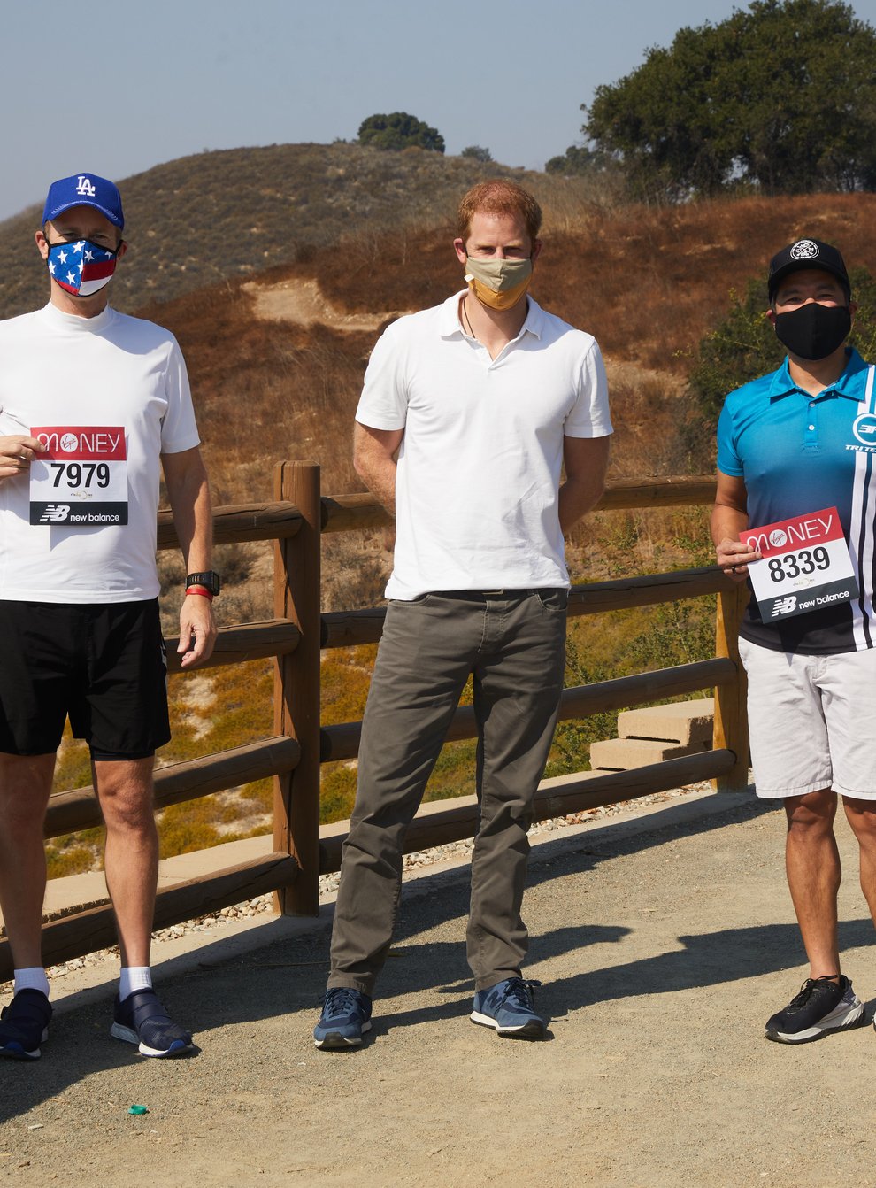 The Duke of Sussex, patron of The London Marathon Charitable Trust, poses with runners in Los Angeles before they take on the virtual Virgin Money London Marathon