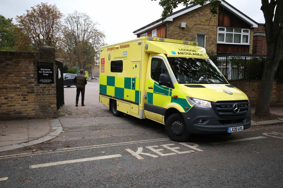 An ambulance leaves La Sainte Union Catholic School