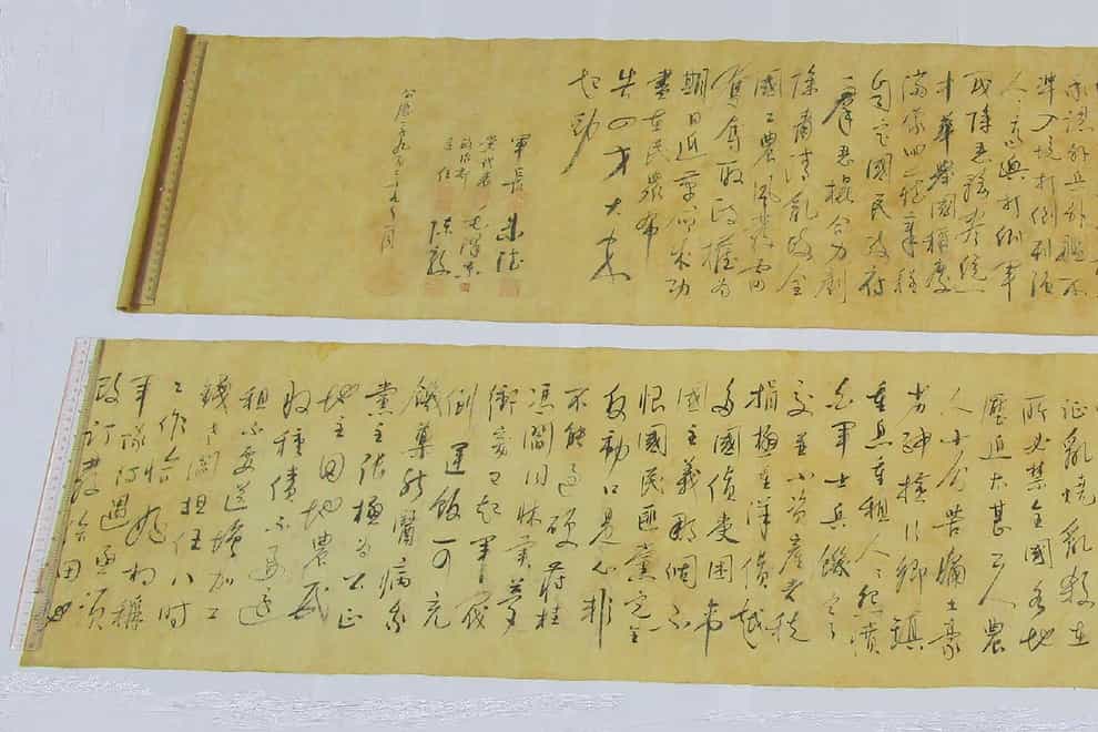 Two pieces of a calligraphy scroll by former Chinese leader Mao Zedong