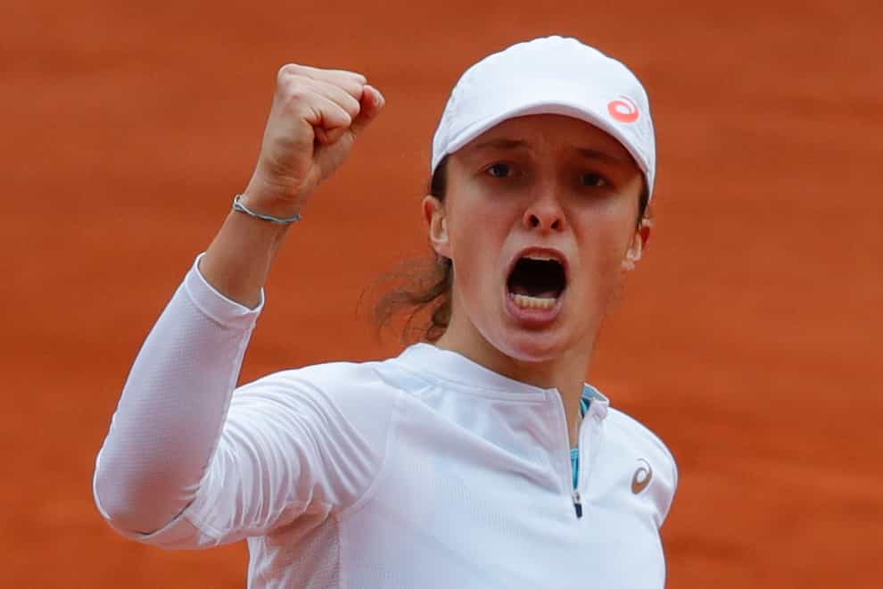 Iga Swiatek clenches her fist during her victory over Nadia Podoroska