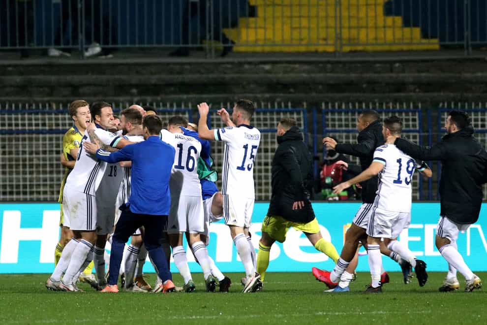 Northern Ireland players celebrate after their penalty shoot-out win in Sarajevo