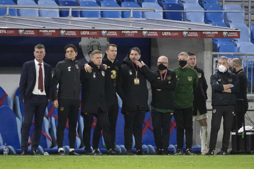 Republic of Ireland head coach Stephen Kenny (left) and his staff watch the penalty shoot-out in Bratislava