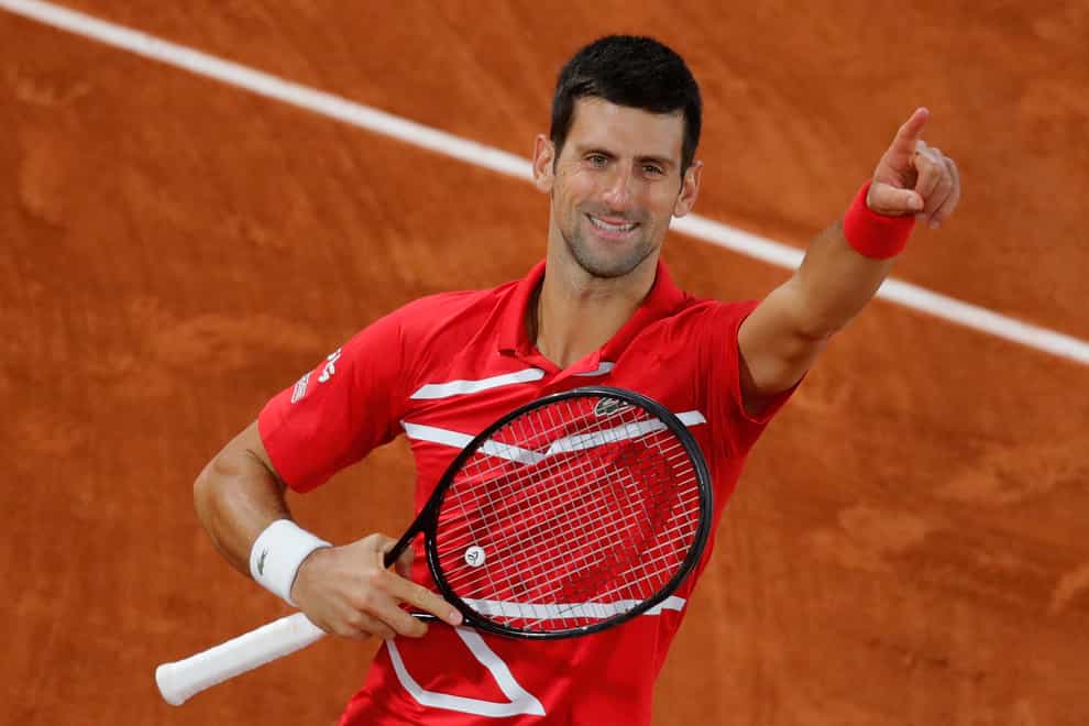 Novak Djokovic celebrates his narrow victory over Stefanos Tsitsipas
