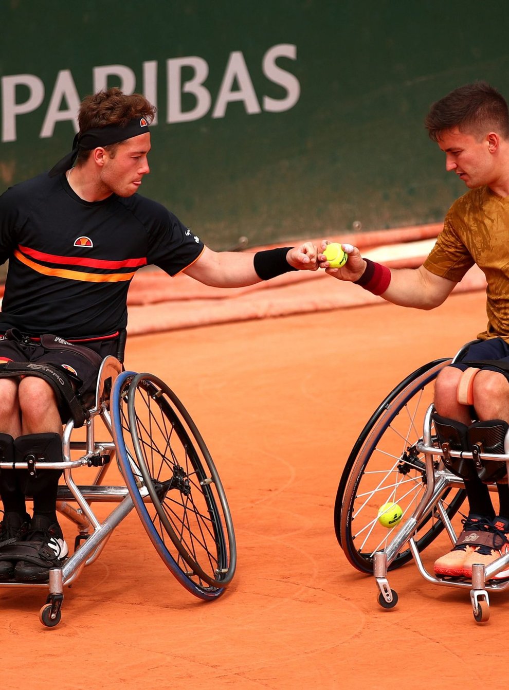 Hewett (left) and Reid won the title at Roland Garros on Friday