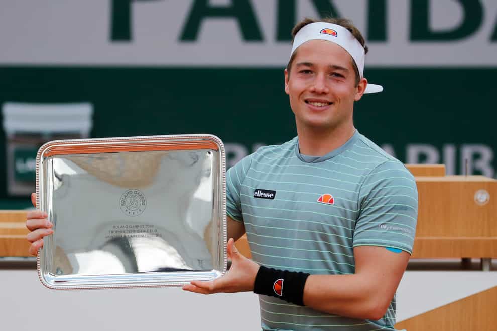 Alfie Hewett holds the French Open trophy