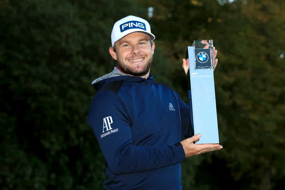 Tyrrell Hatton poses with the trophy after winning the BMW PGA Championship