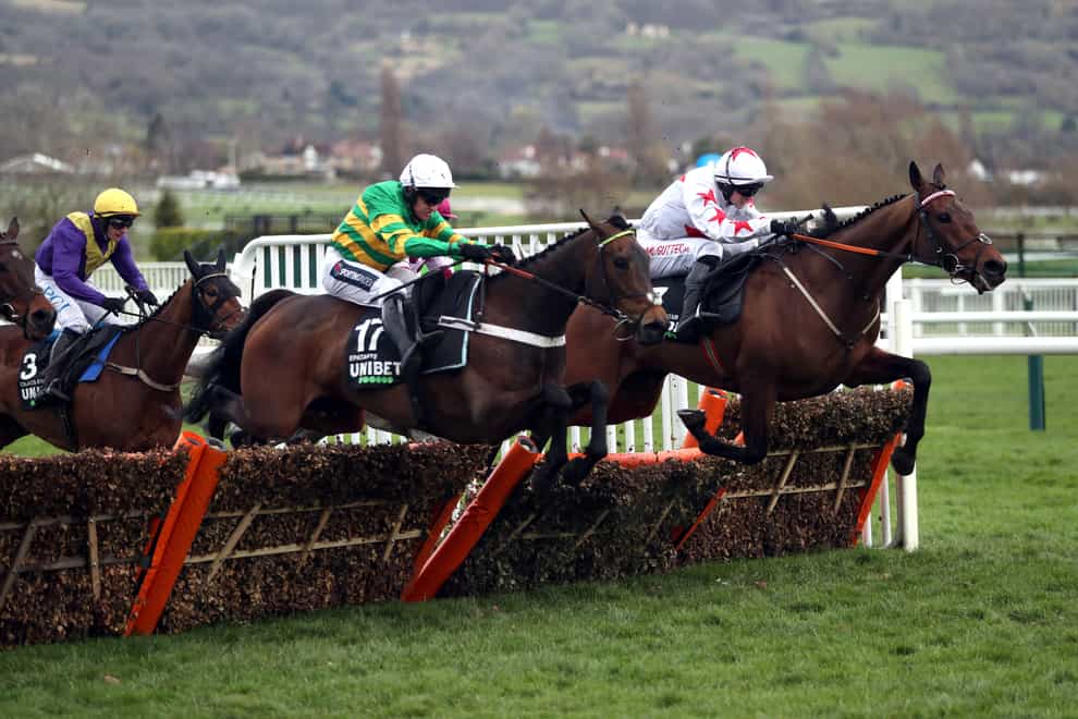 Darver Star (right) on his way to finishing third in the Champion Hurdle