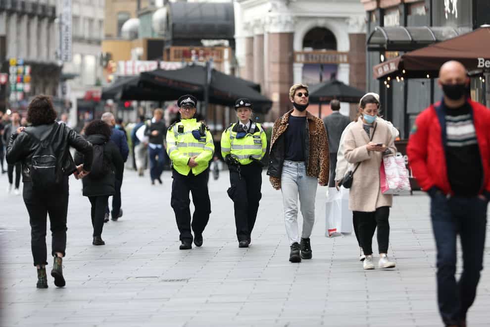 Police officers on patrol in Leicester Square, London