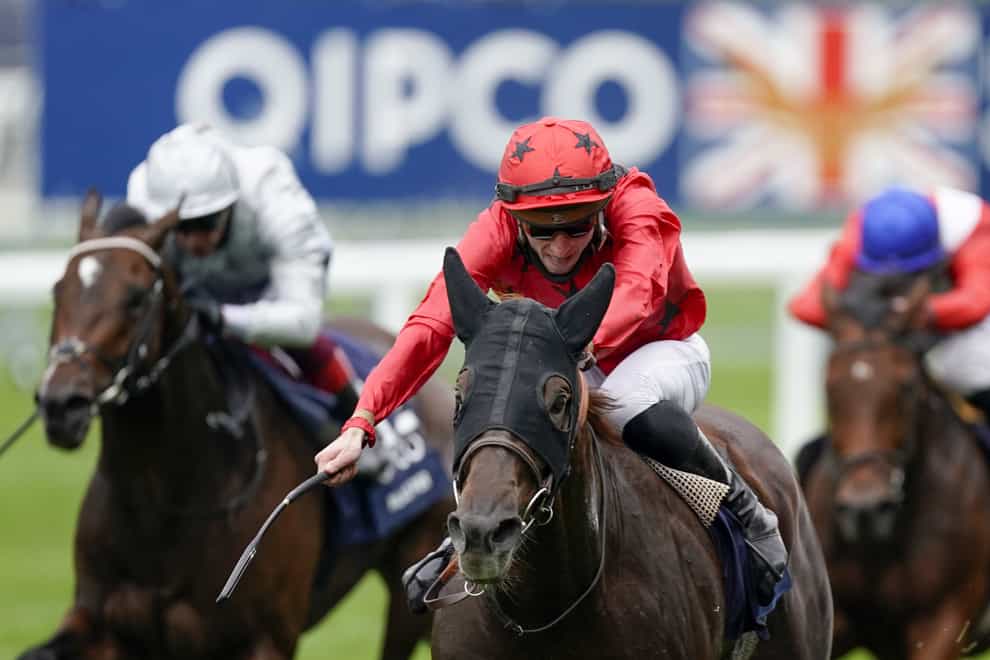 The Revenant ridden by Pierre-Charles Boudot (red) wins the Queen Elizabeth II Stakes