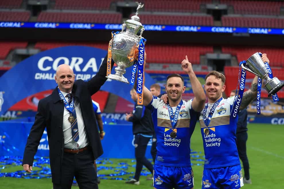 Leeds head coach Richard Agar (left) and Luke Gale (centre) pose with the Challenge Cup trophy