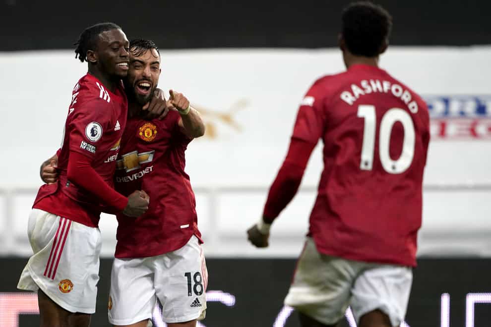 Bruno Fernandes, centre, missed a penalty before helping Manchester United to victory