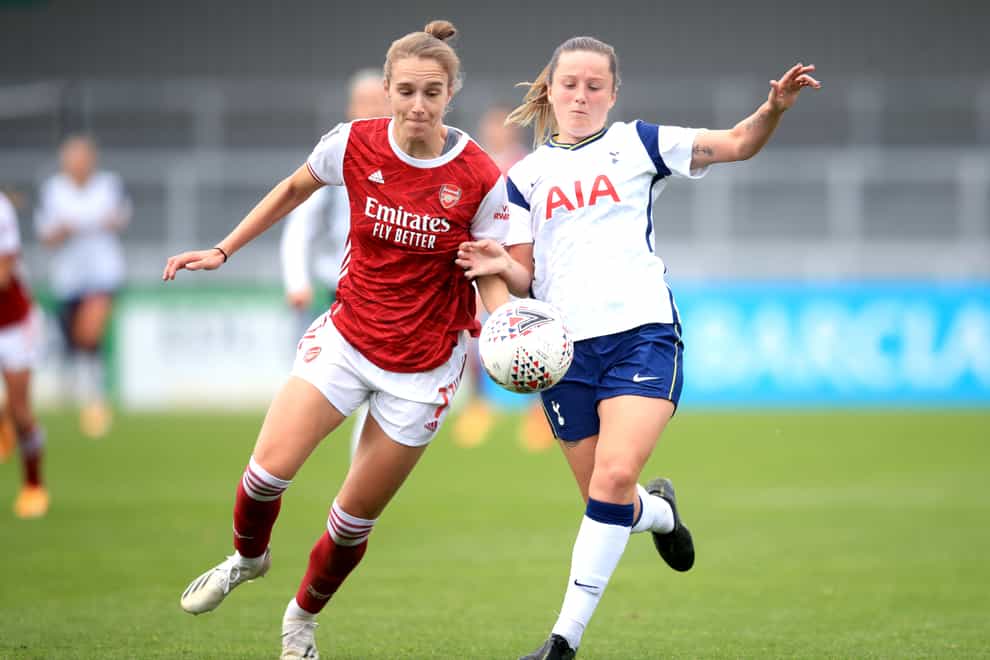 Arsenal’s Vivianne Miedema (left) battles with Tottenham’s Anna Filbey during a 6-1 win in which she scored a hat-trick and set a WSL scoring record.