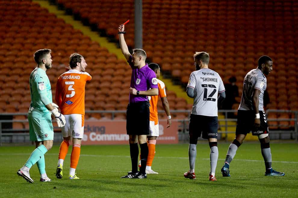 Blackpool defender James Husband was shown a straight red card early on against Charlton
