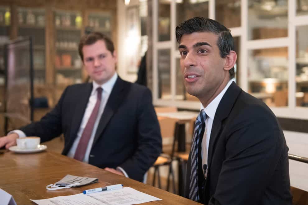 Chancellor Rishi Sunak (right) with Housing Secretary Robert Jenrick, hosting a roundtable for business representatives at Franco Manca in Waterloo, London