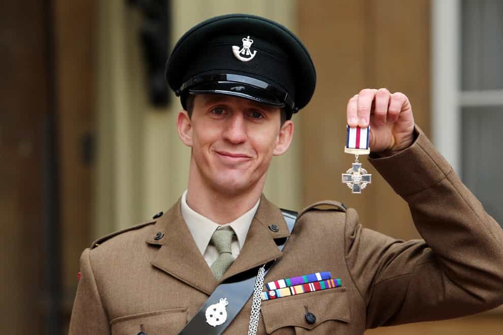 Deacon Cutterham with his Conspicuous Gallantry Cross