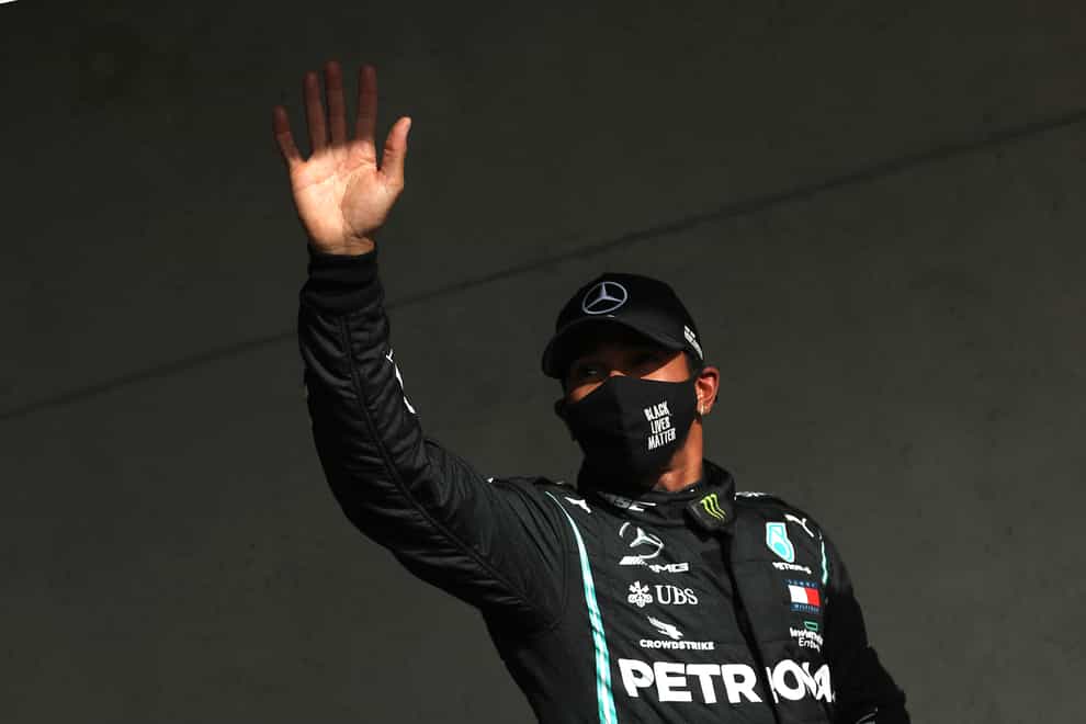Mercedes driver Lewis Hamilton waves to the crowd in Portugal