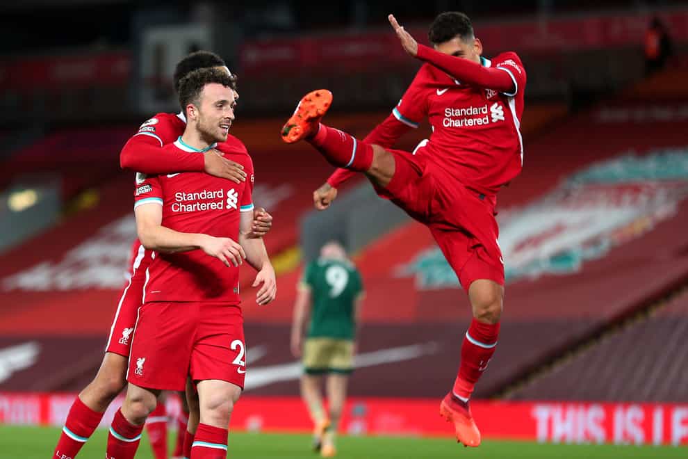 Diogo Jota (centre) sealed victory for the Reds in the second half at Anfield