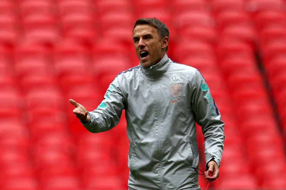 Phil Neville will not be able to take England Women to Germany next week after a positive test within the camp