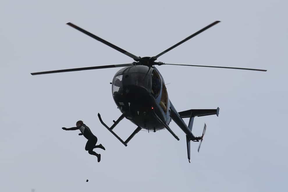 Former paratrooper John Bream jumps without a parachute from a helicopter into the sea off Hayling Island in Hampshire
