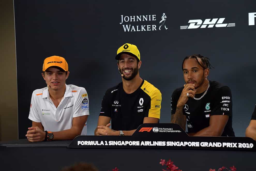 Norris (left) played down Hamilton’s (right) achievements after he won his record-breaking 92nd Grand Prix last weekend
