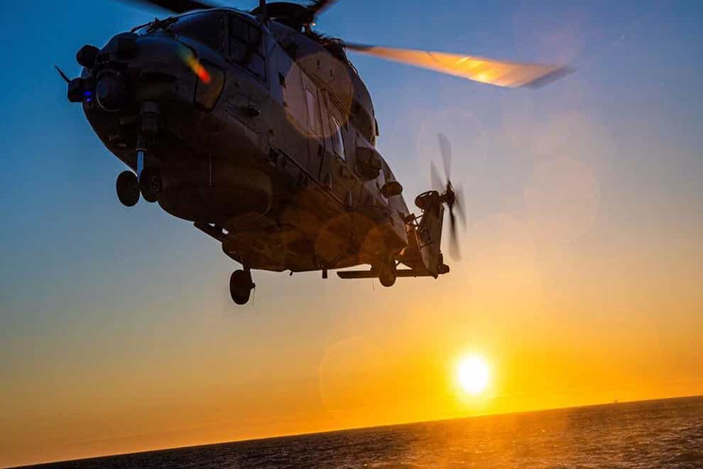 A helicopter taking off from FREMM Frigate Normandie to help with the rescue of migrants from the Channel after French Authorities were contacted by migrants aboard the boat that was taking on water (BNC Departmental Gendarmerie of NH90/PA)
