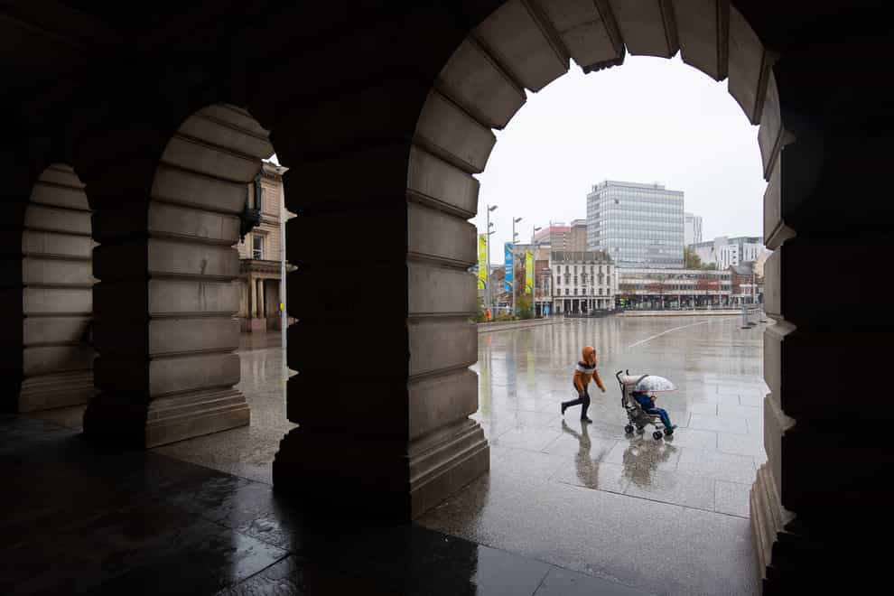 Rain falls in the Old Market Square in Nottingham