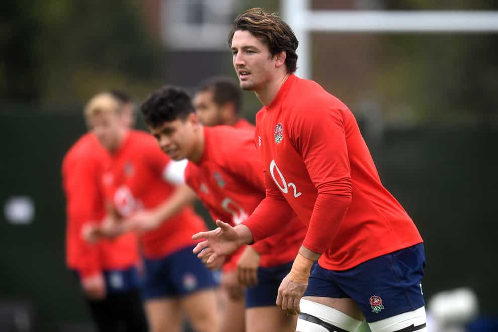 Tom Curry (right) is relishing England's back-row competition