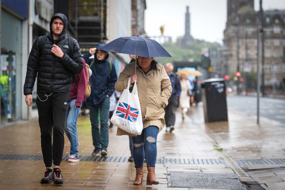 Shoppers along Princes Street in Edinburgh