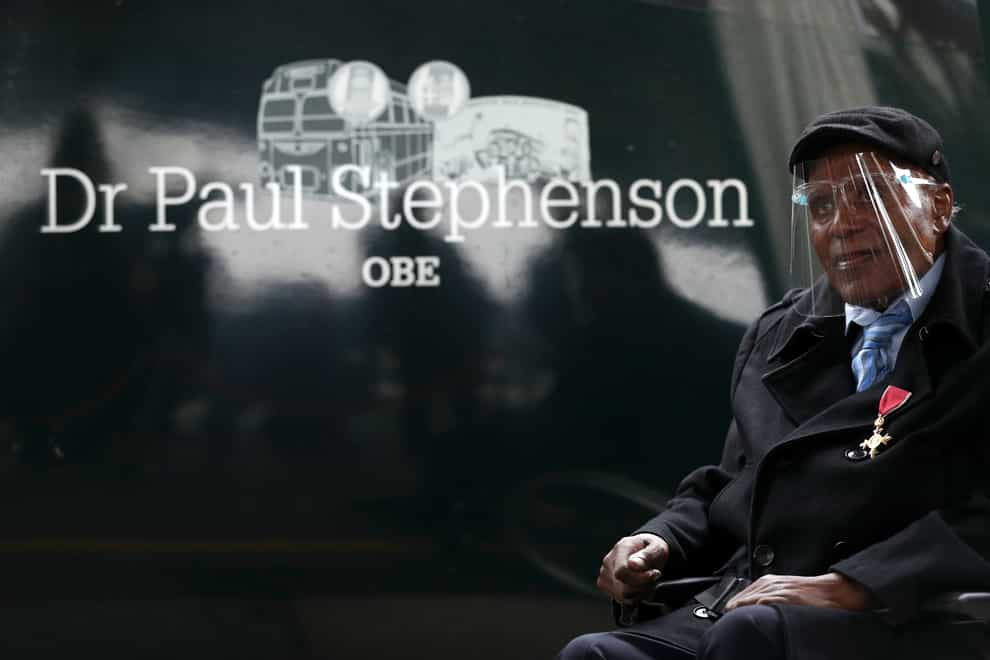 Dr Paul Stephenson next to the train bearing his name (Andrew Matthews/PA)