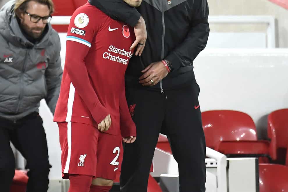 Liverpool boss Jurgen Klopp with Xherdan Shaqiri before his introduction as a substitute and his assist for Liverpool's winner against West Ham