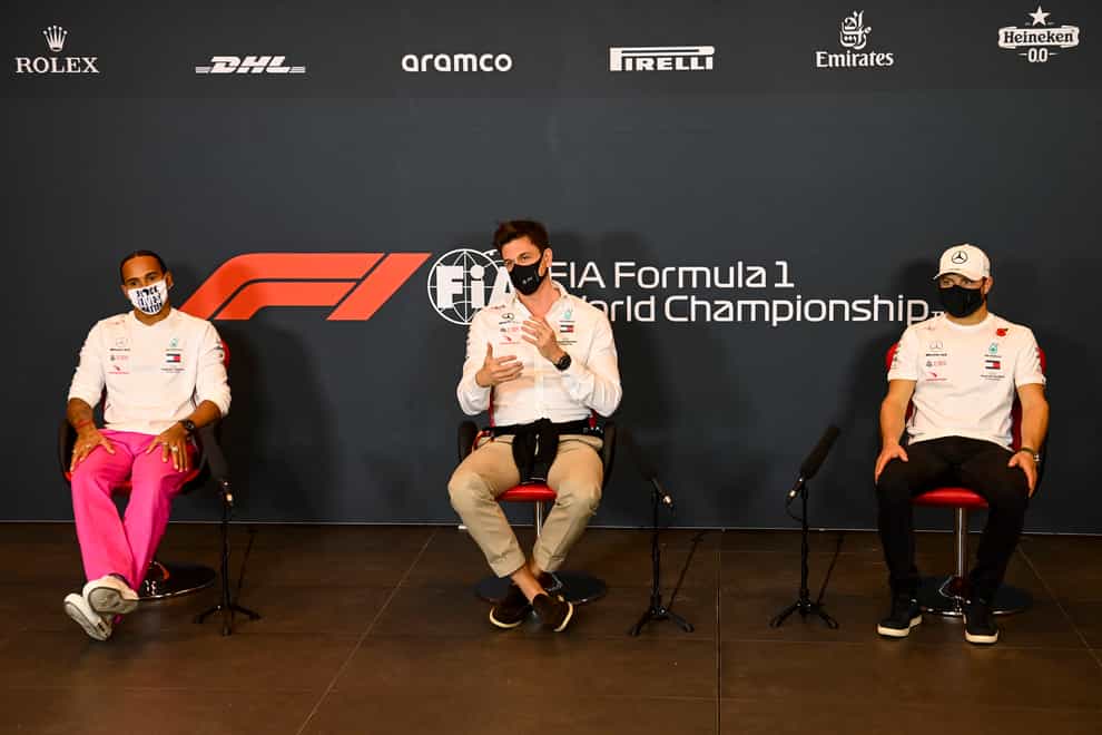Toto Wolff does not think Lewis Hamilton, left, is about to quit Formula One