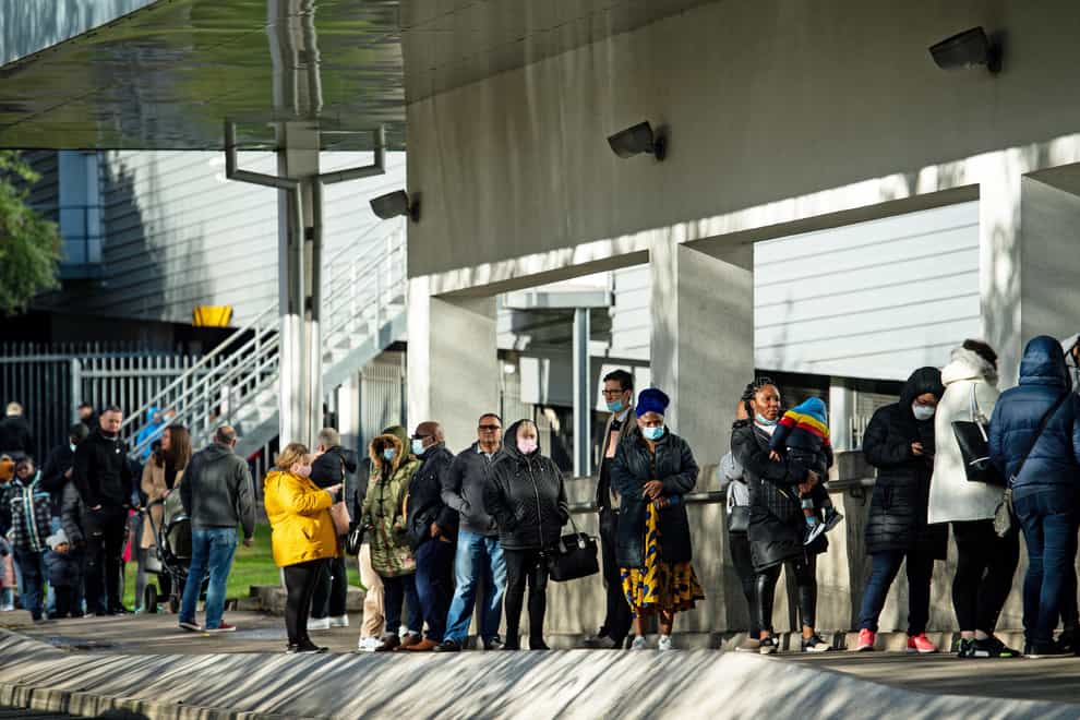 Shoppers queue outside a Costco store in Birmingham, ahead of a national lockdown for England from Thursday (Jacob King/PA)