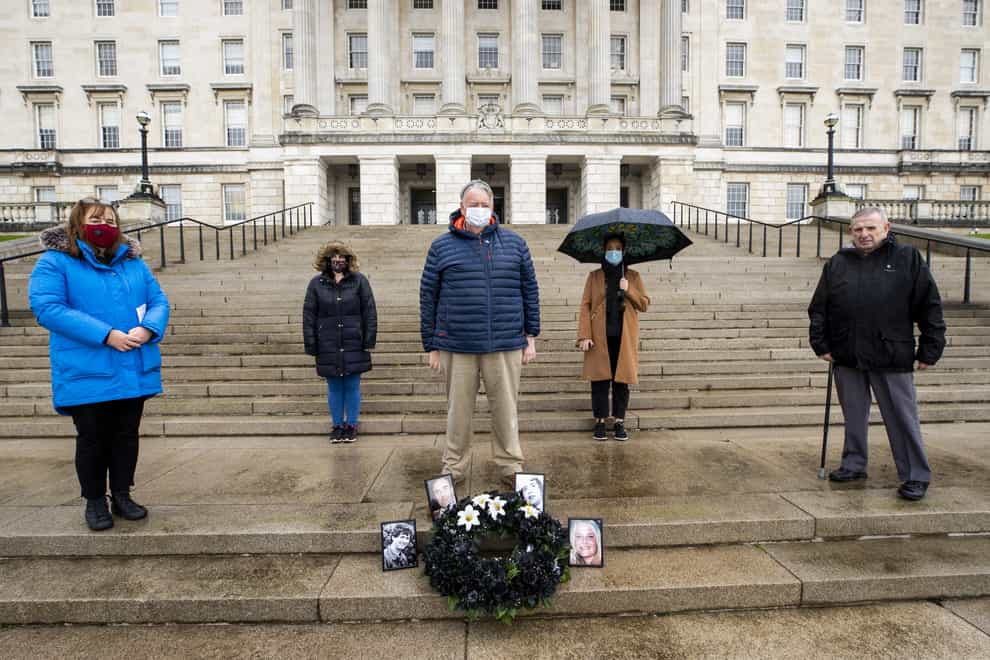 Families of those murdered and buried in secret during Northern Ireland's armed conflict have laid a wreath at the steps of Stormont (Liam McBurney/PA)