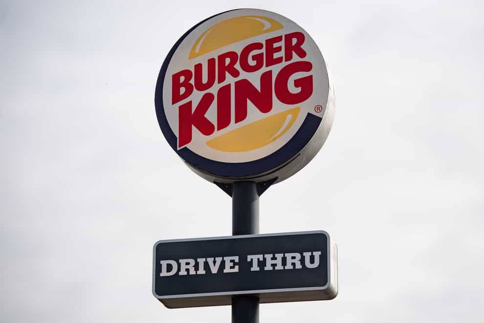 A sign for a Burger King drive thru restaurant