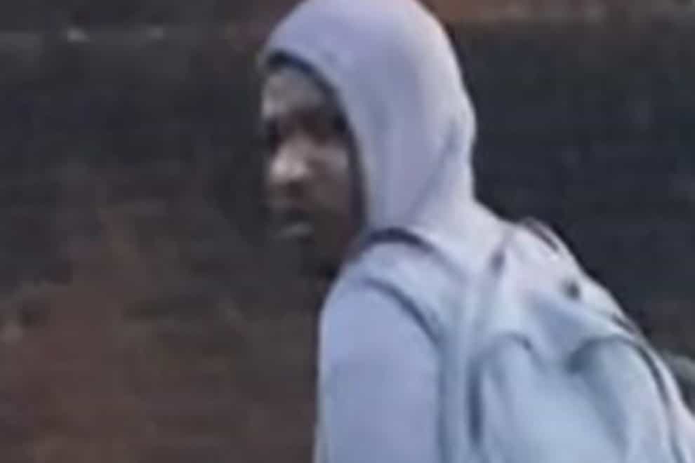 Met Police image of a man they want to speak to in connection with an alleged rape in Mitcham